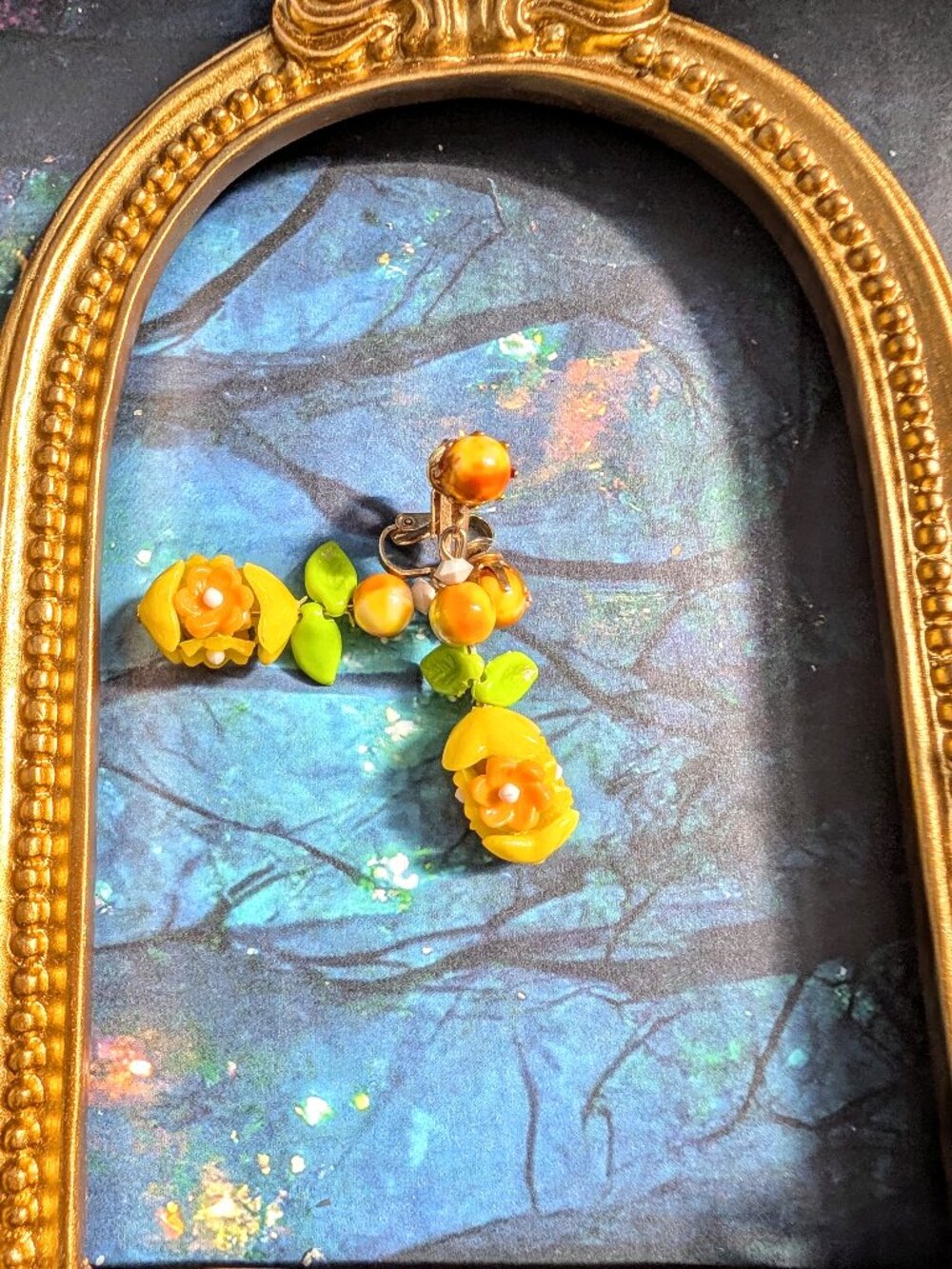 Vintage celluloid stamped Hong Kong Sunny Yellow & Orange Flower Clip-on Earring